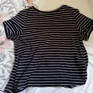 Black and white striped flowy T-shirt slit in the back